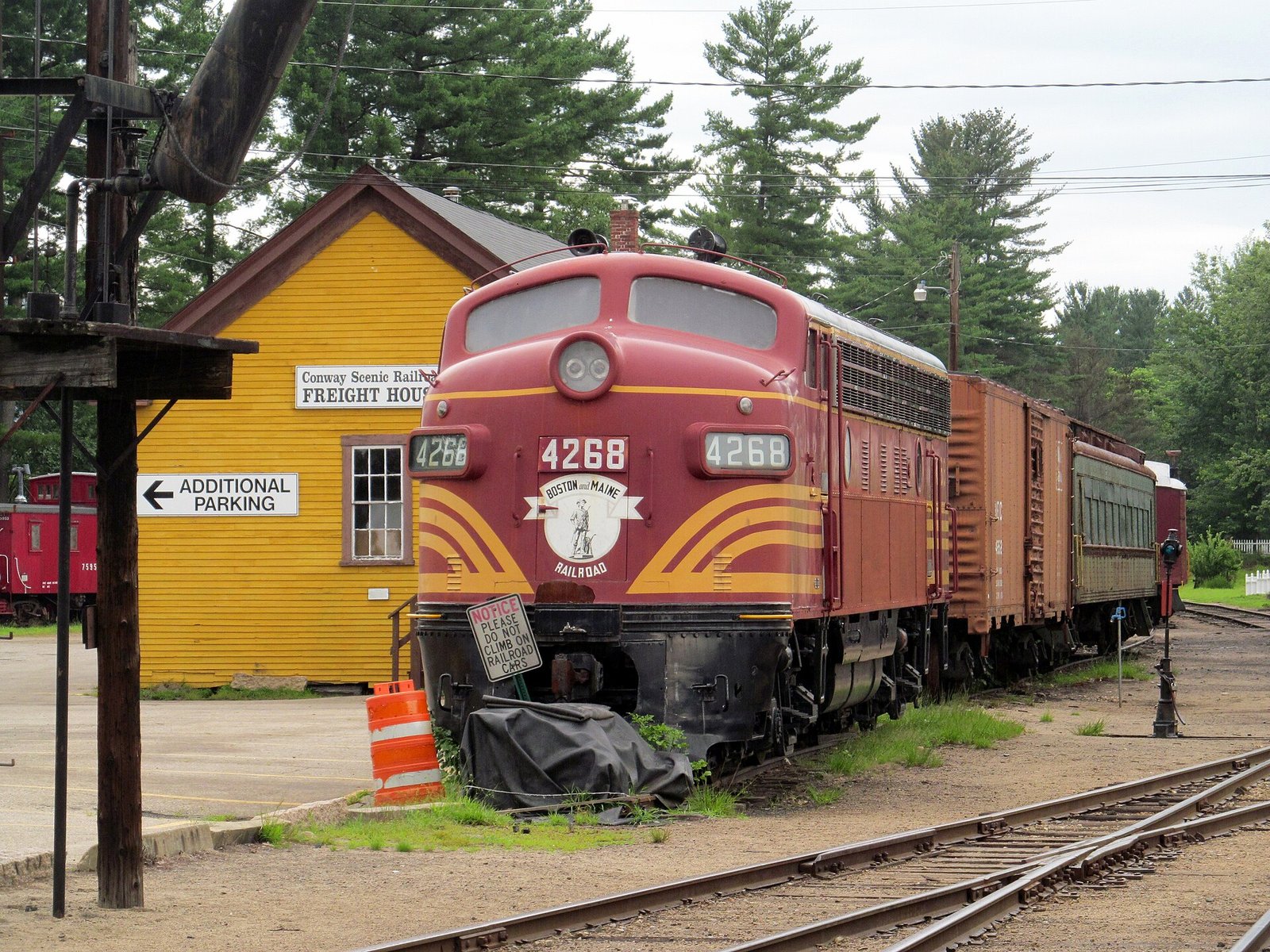 A restored red locomotive at the Conway Scenic Railroad freight house