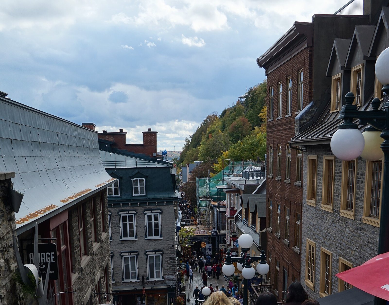 A steep street lined with historic buildings in Old Quebec