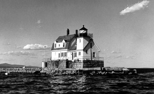 Rockland Harbor Breakwater Light at the end of its stone breakwater